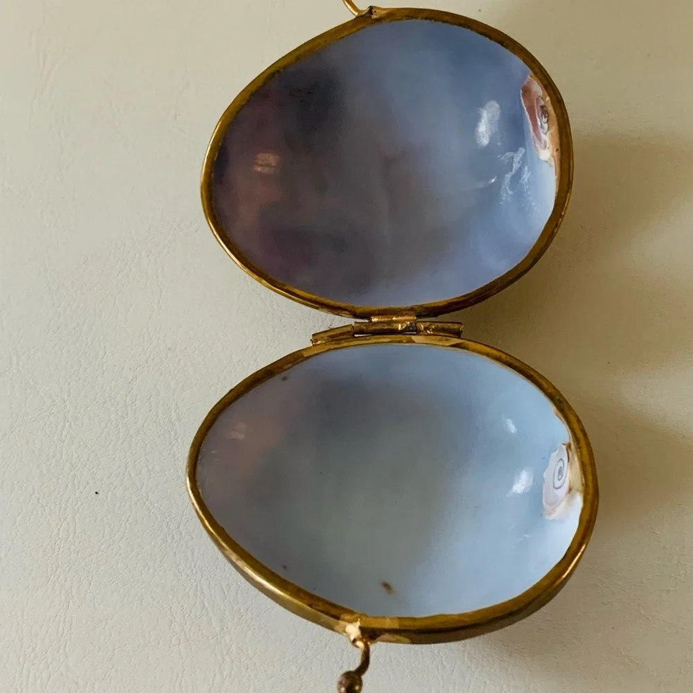 Shell trinket box with brass rim